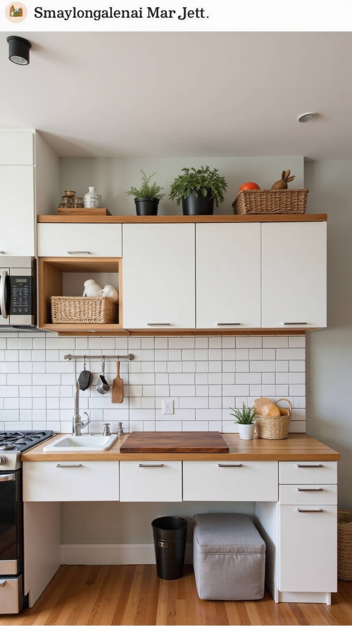 Bird's eye view of compact 7x9ft kitchen with walnut cutting board over sink, folded wall-mounted table, hidden storage ottoman, and morning light highlighting functional zones.