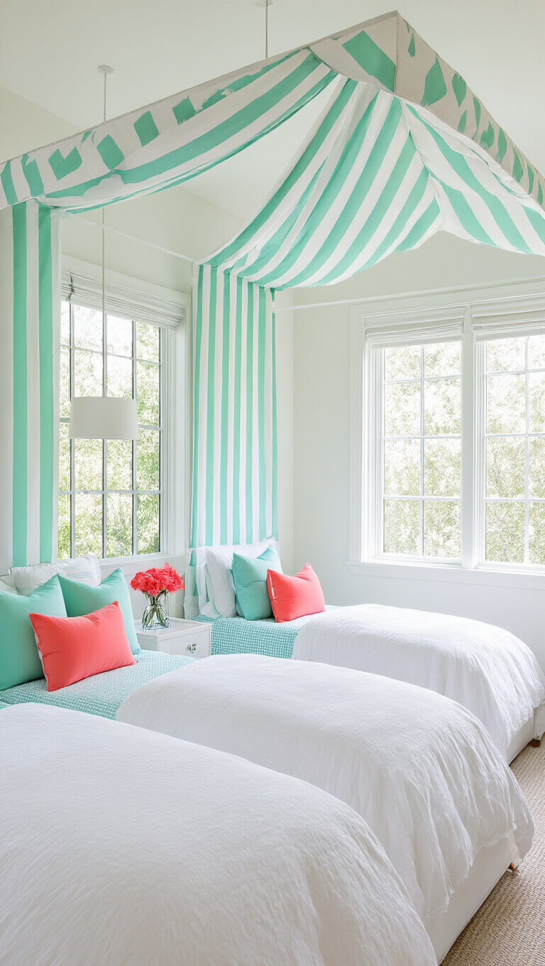 Contemporary girl's room with white metal canopy bed, mint green striped canopy, coral and aqua pillows, and large sunlit windows.